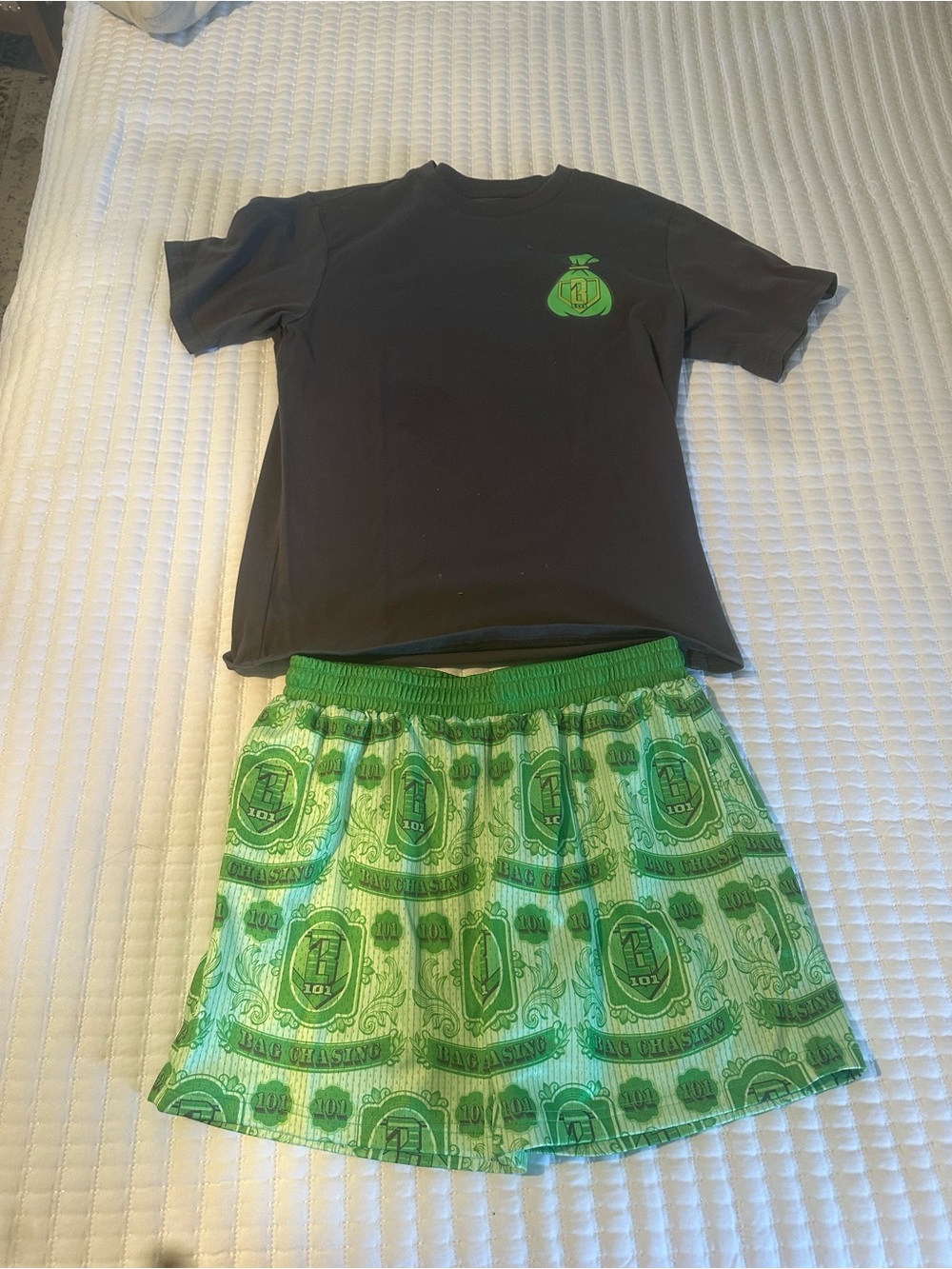 Black Tee with Green Money Bag Graphic & Green Patterned Shorts